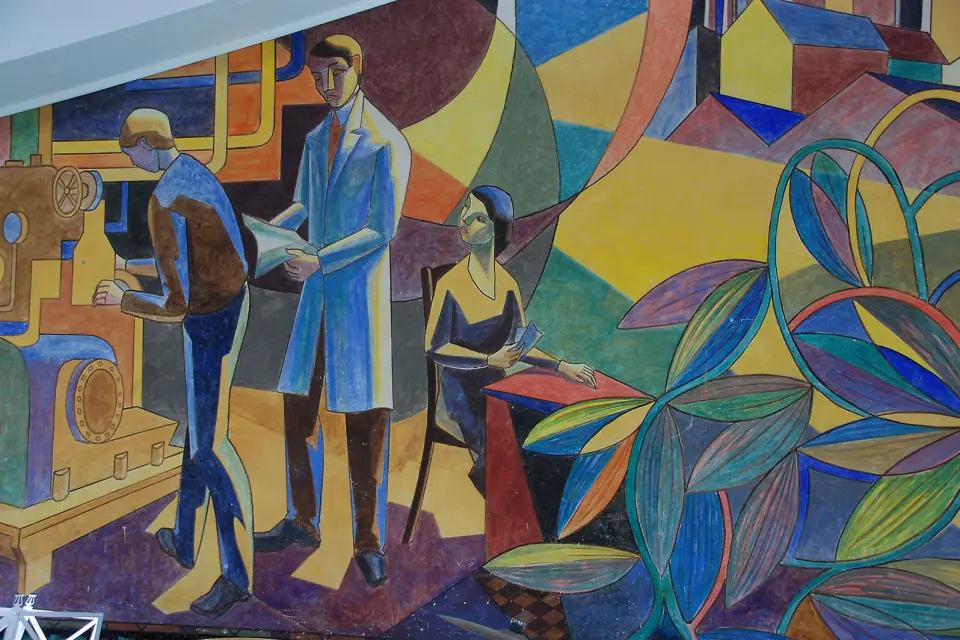 Kunst i kantinen: Utsnitt fra Kai Triers maleri i det som i dag huser Brødrene Grams Historiske Arkiv og Museum. Foto: Henrik Egede Kunst i kantinen: Utsnitt fra Kai Triers maleri i det som i dag huser Brødrene Grams Historiske Arkiv og Museum. Foto: Henrik Egede